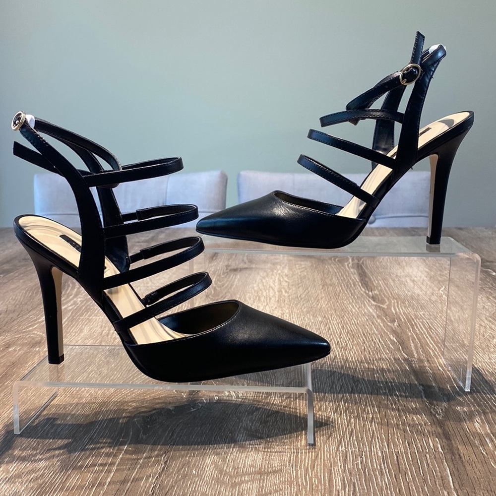 Guess 4” high heels black pumps with straps. Brand new, unused size 6.5.
